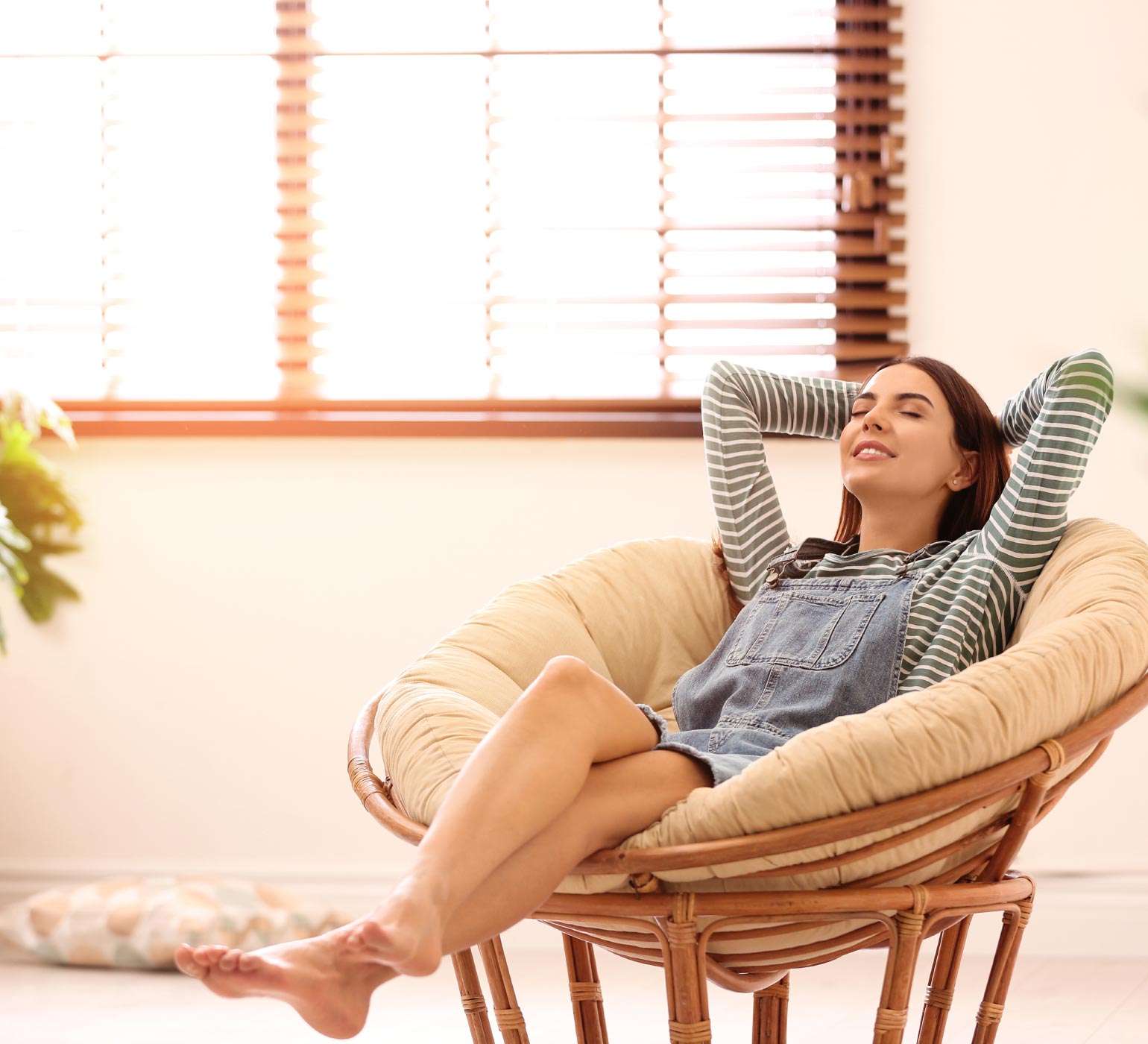 Woman reclining in chair